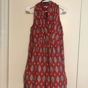 Red Sleeveless lined dress with pockets.